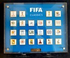Odznaki Mistrzostwa Świata historyczne znaki. FIFA Classics - zestaw 22 sztuk w ramce (produkt oficjalny)