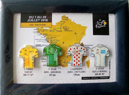Zestaw 4 odznak koszulki liderów Tour de France 2018 w ramce (produkt oficjalny)