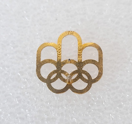Odznaka Letnie Igrzyska Olimpijskie Montreal 1976 logo, pozłacana (produkt oficjalny)